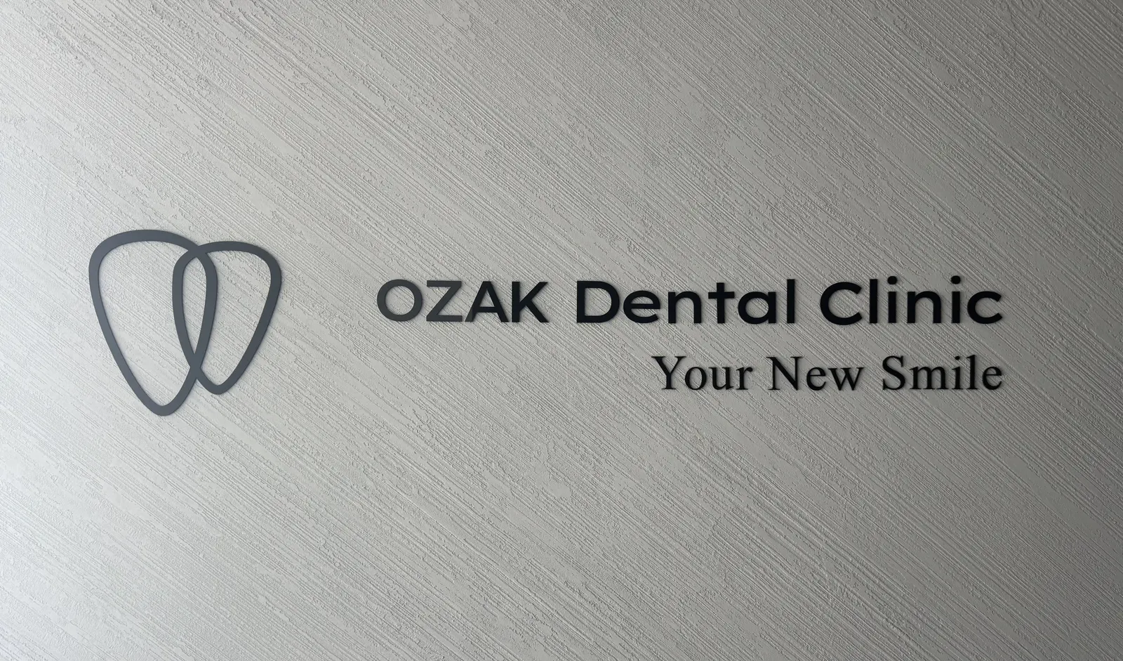 OZAK DENTAL CLINIC logo